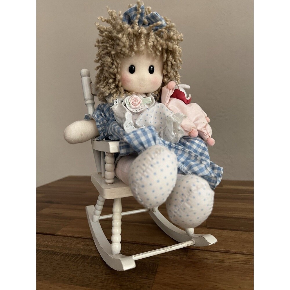 Vintage Wind-Up Music Box Doll in Blue Gingham Dress on White Rocking Chair